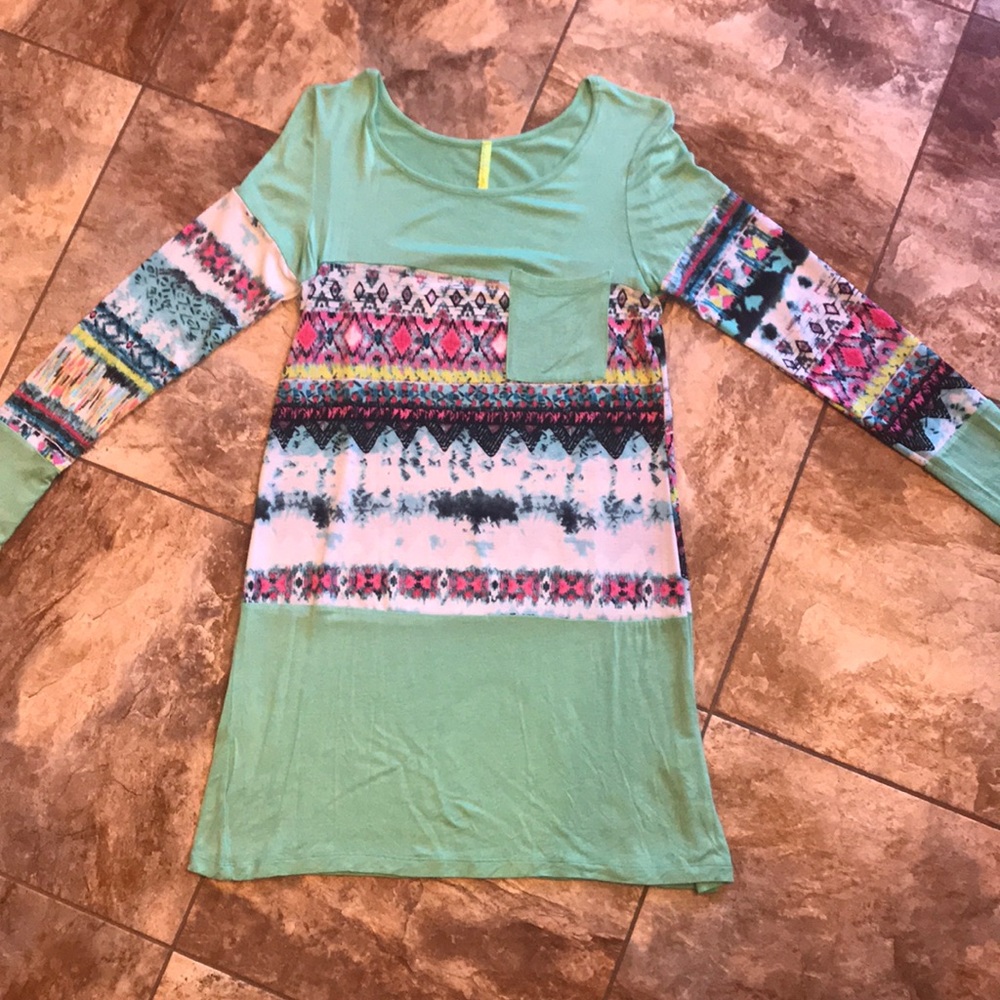 Woman’s teal dress